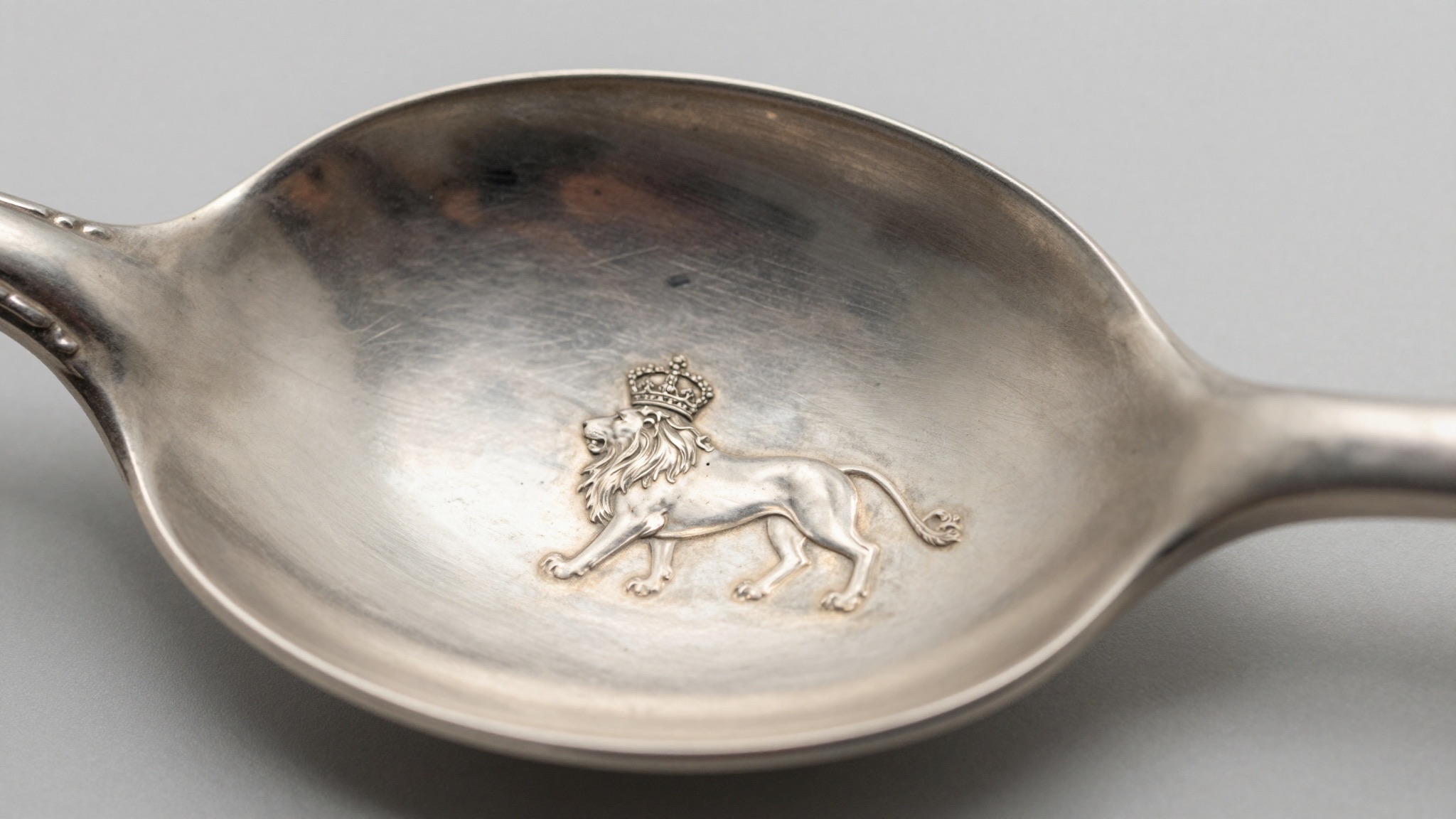 Antique Sheffield sterling silver piece showing a crown town hallmark