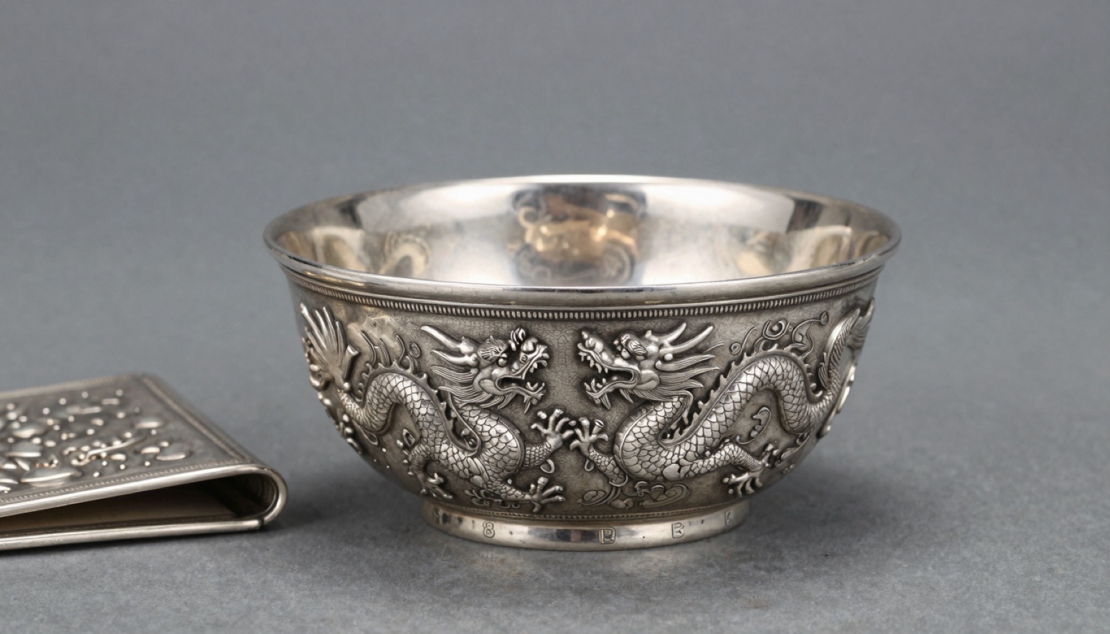 Chinese Export Silver marks and pseudo-hallmarks on an antique dragon-decorated silver piece